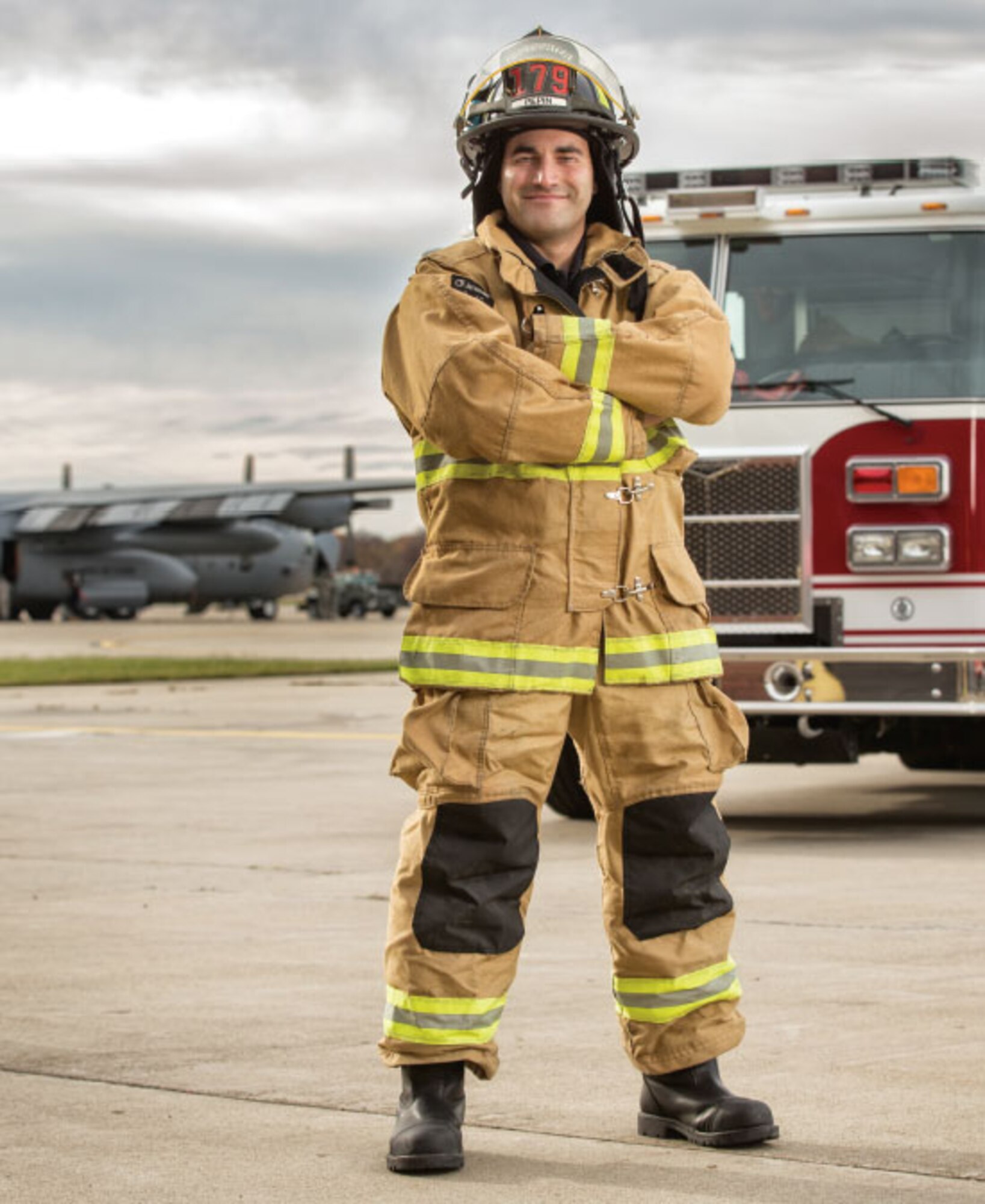 Andrew Pepin talks about his future, he describes a career path that’s red hot with embers he’s stoked thoughtfully, methodically and academically, every step of the way. Pepin is a civilian firefighter with the Air National Guard’s 179th Airlift Wing located in Mansfield, Ohio. (Photo by Keith Berr/PHOENIX PATRIOT Winter 2014)