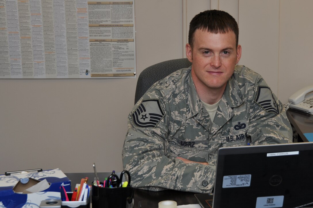 Master Sgt. Thomas Merz, noncommissioned officer in charge of the 911th Airlift Wing Airman and Family Readiness Office, has been an Airman at the Pittsburgh International Airport Air Reserve Station since 1999. His favorite part of the job, as he said, is “putting a happy face on the Air Force,” or helping Airmen to mitigate problems and focus on the mission. (U.S. Air Force photo by Senior Airman Marjorie A. Bowlden)