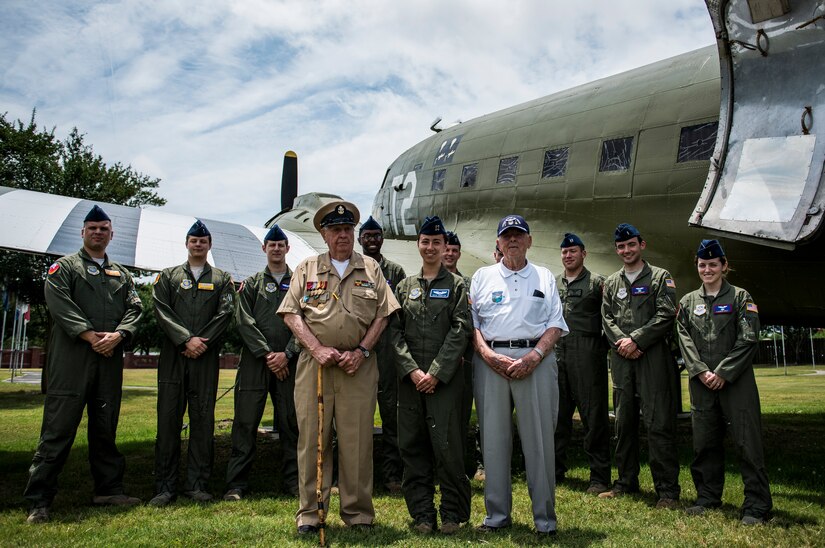 Retired Army Air Force Don Wallace, C-47 Skytrain pilot, and retired Navy Chief Petty Officer Arlington Sandford,   tour the C-47 along with Airmen from the 437th Airlift Wing June 6, 2014, in honor of the 70th Anniversary of D-Day at Joint Base Charleston, S.C. Both Wallace and Sandford served during D-Day. (U.S. Air Force photo/ Senior Airman Dennis Sloan)