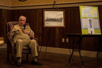 Retired Navy Chief Petty Officer Arlington Sandford, recounts the events of D-Day and his service in the Navy during World War II to Airmen, families and community members during a visit June 6, 2014, in honor of the 70th Anniversary of D-Day at Joint Base Charleston, S.C. Sandford served in the engine room onboard a landing craft and was also a 20 mm gunner.  (U.S. Air Force photo/ Senior Airman Dennis Sloan)