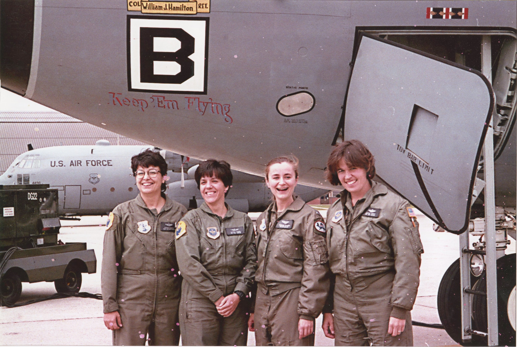 ANDREWS AIR FORCE BASE, MD.-- In this scanned photo from October 1997, from left to right, Tech. Sgt. Elaina D’Orto, Maj. Nicole Bixler, 1st Lt. Justyna Hudson and Capt. Laurie Farris stand beside a Pease KC-135 Stratotanker after flying a group of veterans to the dedication ceremony for the Air Force Women’s Memorial at Arlington National Cemetery. Bixler was the navigator for the first ever all-female flight crew that made the historic flight. (N.H. Air National Guard photo by Maj. Bill Becker)