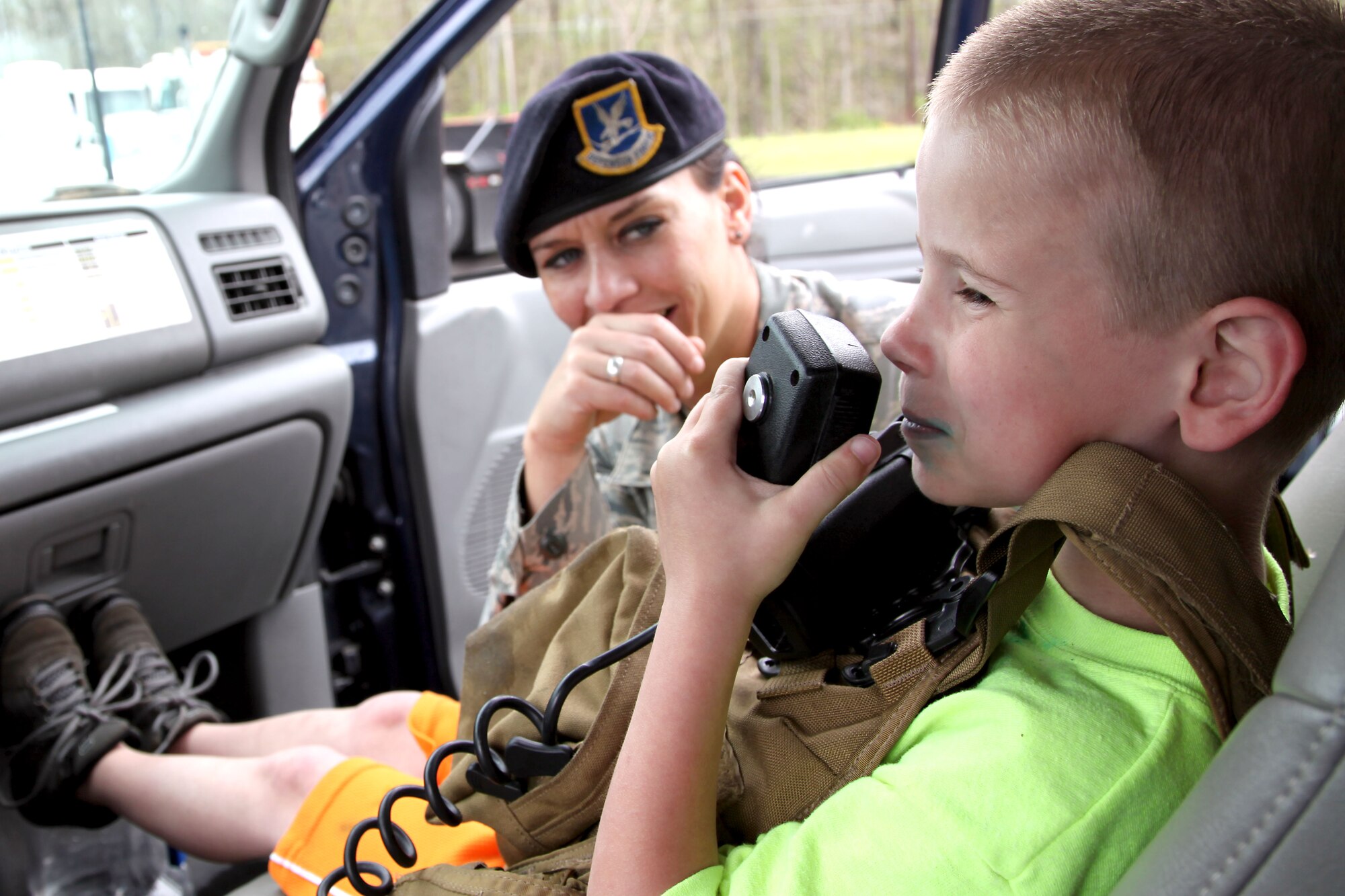 179 Security Forces troops enjoy “Touch a Truck” day with the students at Madison South Elementary school, Mansfield, Ohio, May 9, 2014. Tech. Sgt. Brandon Velemirov and Staff Sgt. Michelle Roark from 179th Security Forces Squadron volunteered to take a Security Forces vehicle to Madison South Elementary school for the afternoon. TSgt Velemirov and SSgt Roark gave the kids a taste of what it’s like to be in the military and military police.(U.S. Air National Guard Photo by MSgt Lisa Haun \Released)