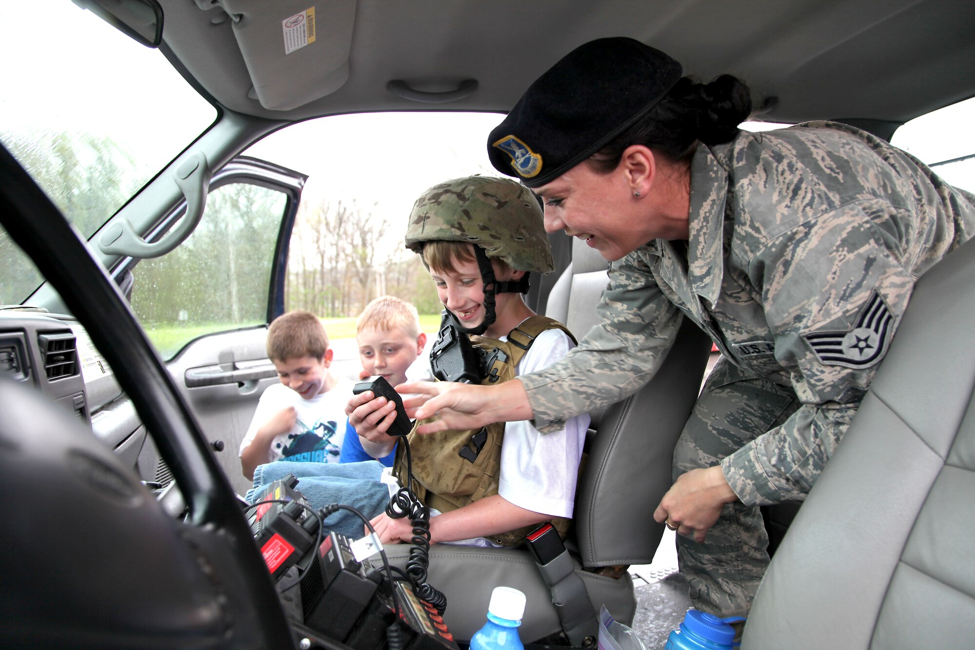 179 Security Forces troops enjoy “Touch a Truck” day with the students at Madison South Elementary school, Mansfield, Ohio, May 9, 2014. Tech. Sgt. Brandon Velemirov and Staff Sgt. Michelle Roark from 179th Security Forces Squadron volunteered to take a Security Forces vehicle to Madison South Elementary school for the afternoon. TSgt Velemirov and SSgt Roark gave the kids a taste of what it’s like to be in the military and military police.(U.S. Air National Guard Photo by MSgt Lisa Haun \Released)
