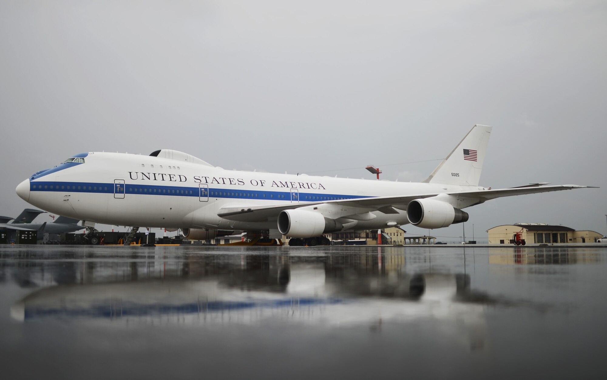 A U.S. Air Force E-4B aircraft sits on the ramp outside the 726th Air Mobility Squadron at Spangdahlem Air Base, Germany, June 4, 2014. The E-4B, a militarized version of the Boeing 747-200, serves as the National Airborne Operations Center and provides the President of the United States, the U.S. Secretary of Defense and the Chairman of the Joint Chiefs of Staff with a worldwide, survivable and enduring command center for exercising national security responsibilities through all levels of conflict. The parked aircraft recently supported President Obama’s visit to Europe. (U.S. Air Force photo by Senior Airman Gustavo Castillo/Released)