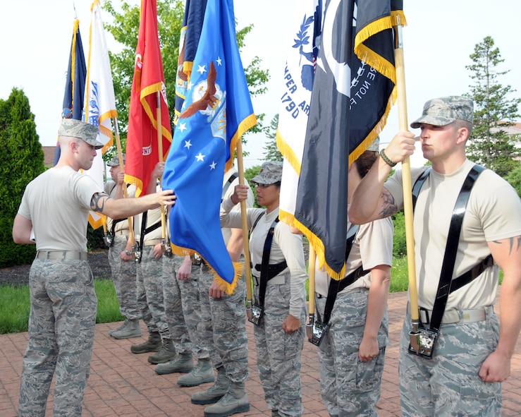 Airman 1st Class Trevor Gaby (left), U.S. Air Force Honor Guard Trainer from Joint Base Anacostia-Bolling, Washington, D.C. does an inspection during colors training of honor guard trainees on June 10, 2014 at the Niagara Falls Air Reserve Station, N.Y. Air Force Reserve and Air National Guard members from the 914th and 107th Airlift Wings including units from all over N.Y. and N.J.  attended this unique eight day training. (U.S. Air Force photo by Peter Borys)