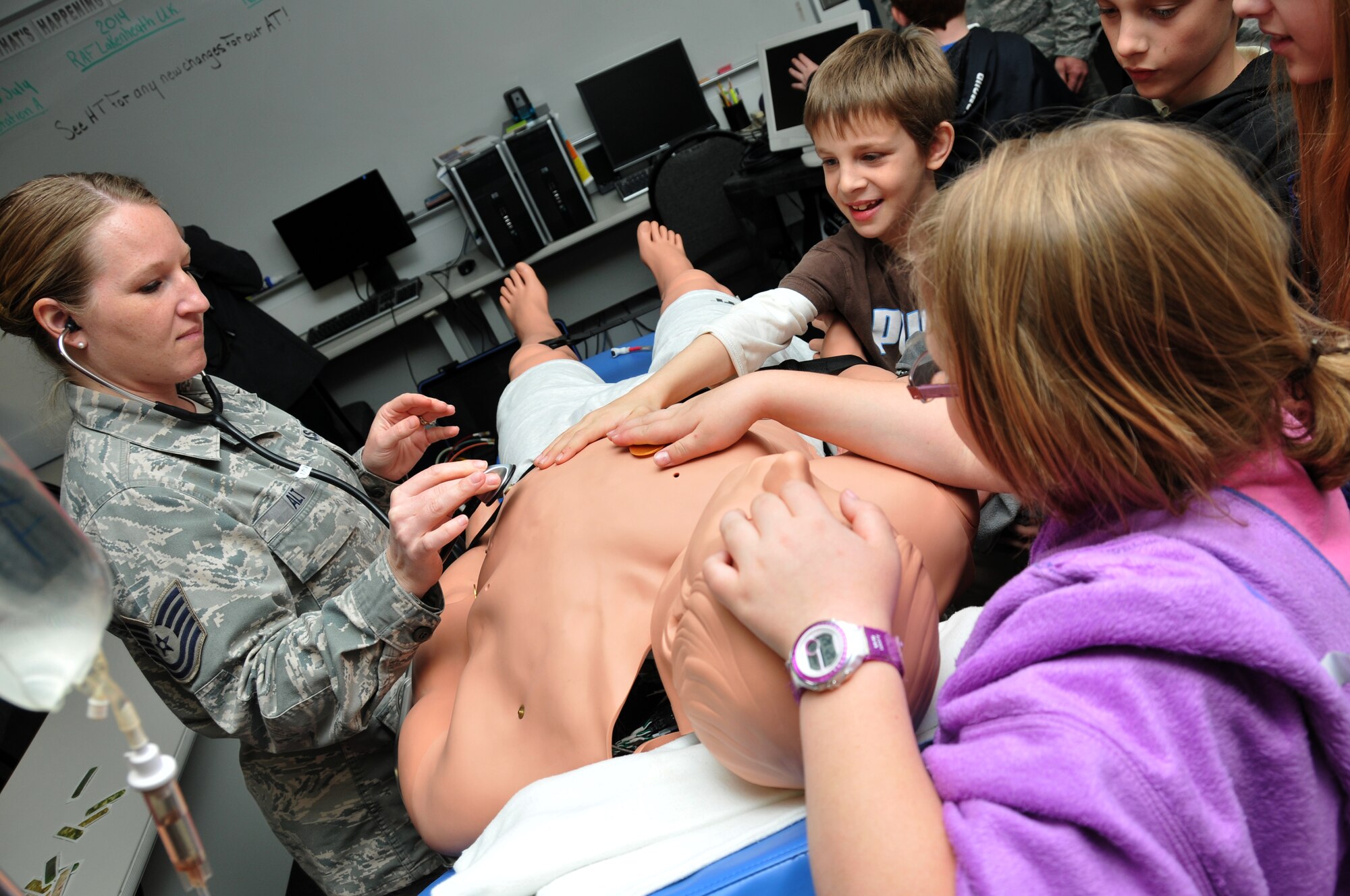 The 179th Airlift Wing particpated in the national Take Our Daughters and Sons to Work Foundation, Mansfield, OH, July 6, 2013. The event gave members children the chance to join their parent for a day of work at an Air National Guard Installation, with activity stations for each child to learn about the different jobs around the unit. (U.S. Air National Guard photo by Technical Sergeant Joe Harwood/Released)