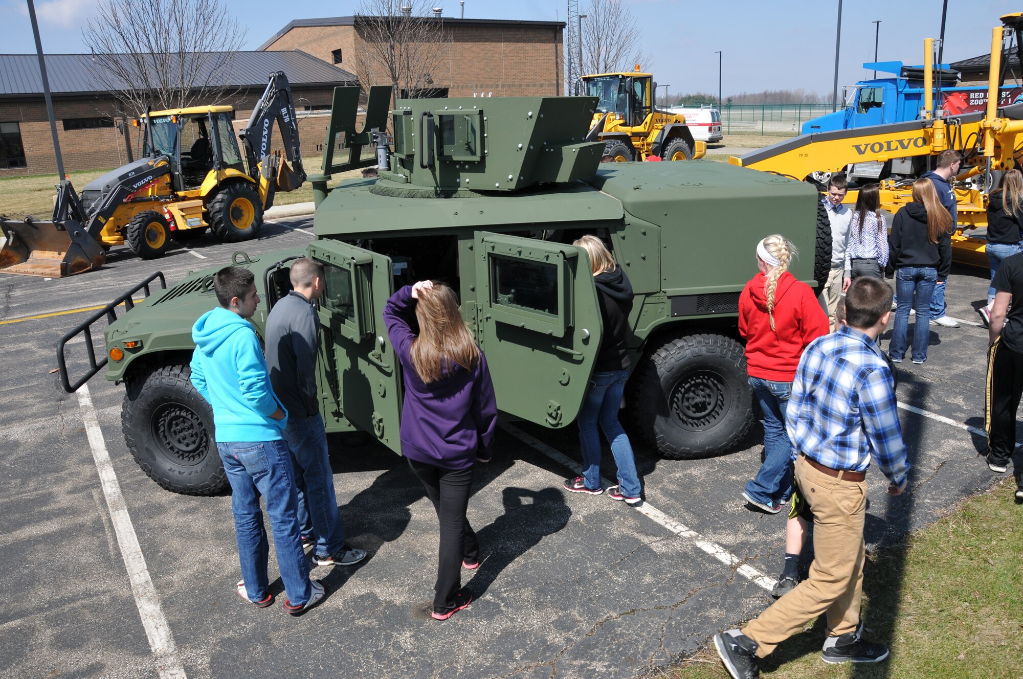 Members of the 179th Airlift Wing organize an event to help develop student athletes from the Northern 10 Athletic Conference, April 8, 2014, Galion, OH. The student athletes were seperated into teams unrelated to their schools and rotated through 6 stations designed to develop leadership skills and familiarity of Air Force customs.The 200th REDHORSE set up a station displaying some of their heavy equiptment used and a chance to see what it's like to sit in the operaters seat. (U.S. Air National Guard Photo by TSgt Joseph Harwood \Released)