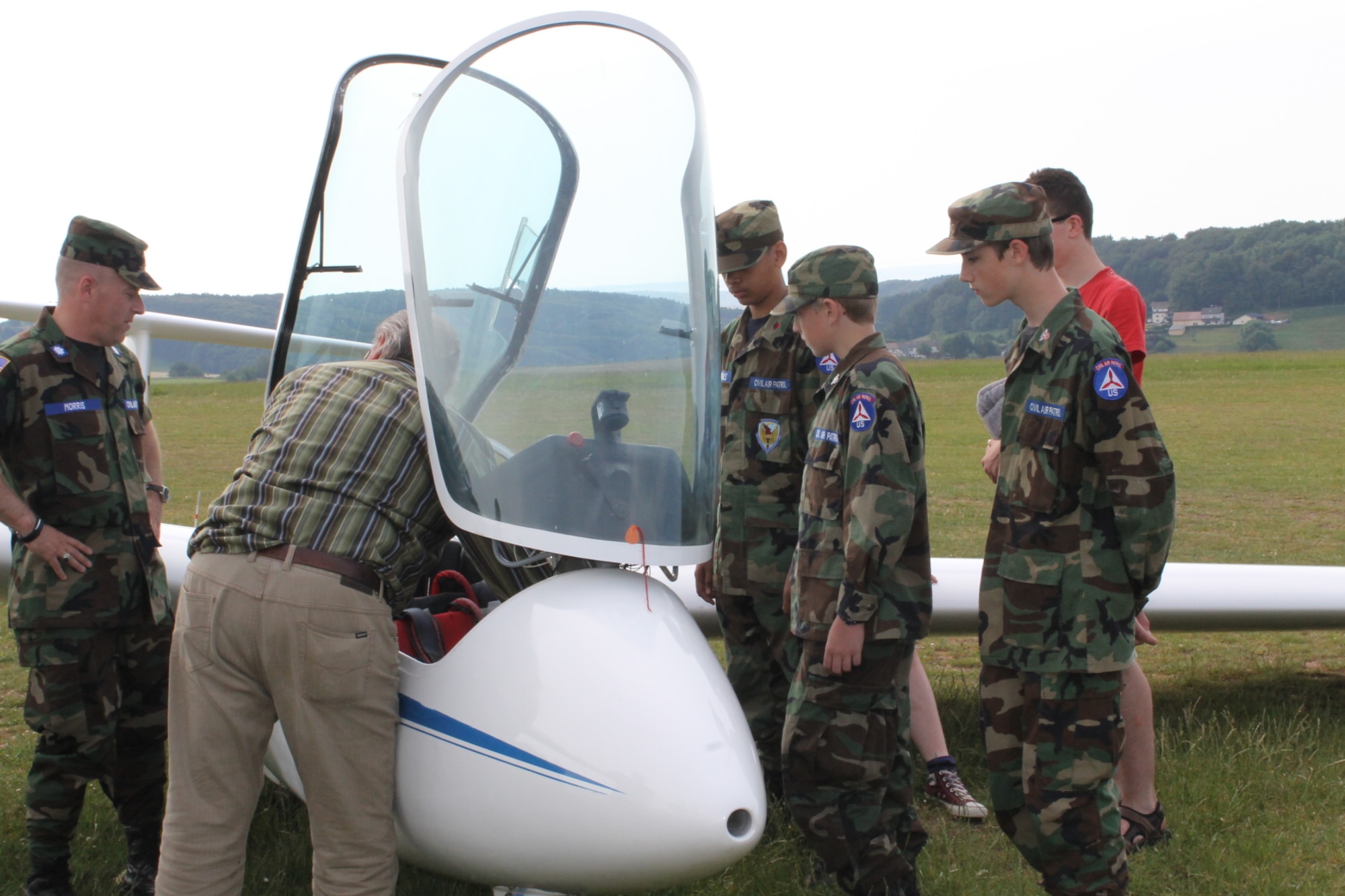 The Spangdahlem Cadet Squadron, Civil Air Patrol, learn about the operations of an ASK-21 Glider June 8, 2014, as part of a Flight Orientation Program. The group meets every Thursday from 6-8:30 p.m. Youth ages 12 to 18 may join the CAP. For general information on the program, visit http://www.gocivilairpatrol.com. For more information about the Spangdahlem CAP squadron, email nhqos126@yahoo.com or visit http://www.facebook.com/capspangdahlem. (Courtesy photo/released)