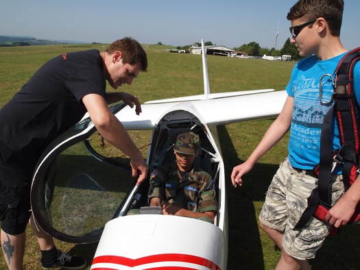 Civil Air Patrol Cadet Teagan Thomas receives instruction on an ASK-21 Glider June 8, 2014, as part of a CAP Flight Orientation Program. The cadets started the day learning the basics of glider flight and were soon flying the gliders hundreds of feet above the Eifel. (Courtesy photo/released)