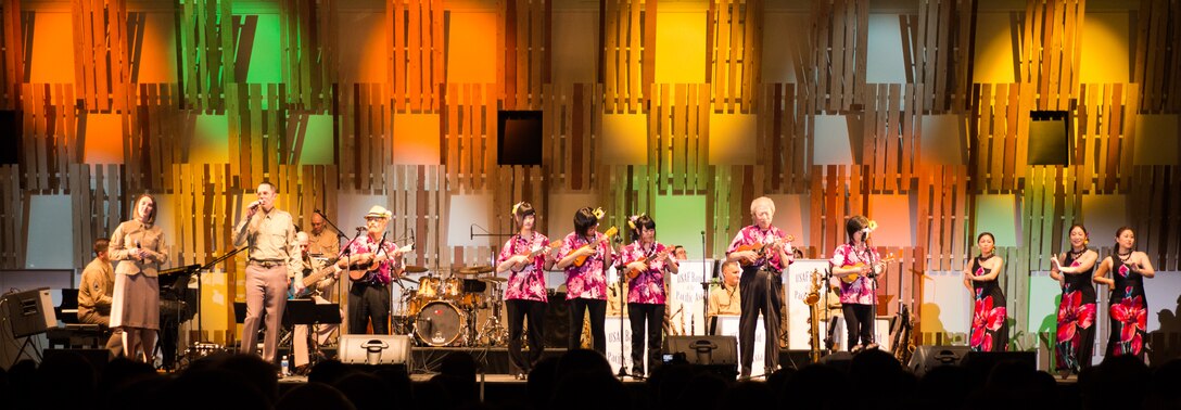 NAGAOKA CITY, Japan -- Pacific Showcase, Band of the Pacific-Asia, performs "Over the Rainbow" with the local "Aloha Club" in Nagoaka City, Japan on June 6, 2014. The bilateral performance of "Over the Rainbow" was a symbol of friendship between two sister cities, Nagoaka City, Japan and Honolulu, HI. (U.S. Air Force photo by Staff Sgt. Josh Voyles)