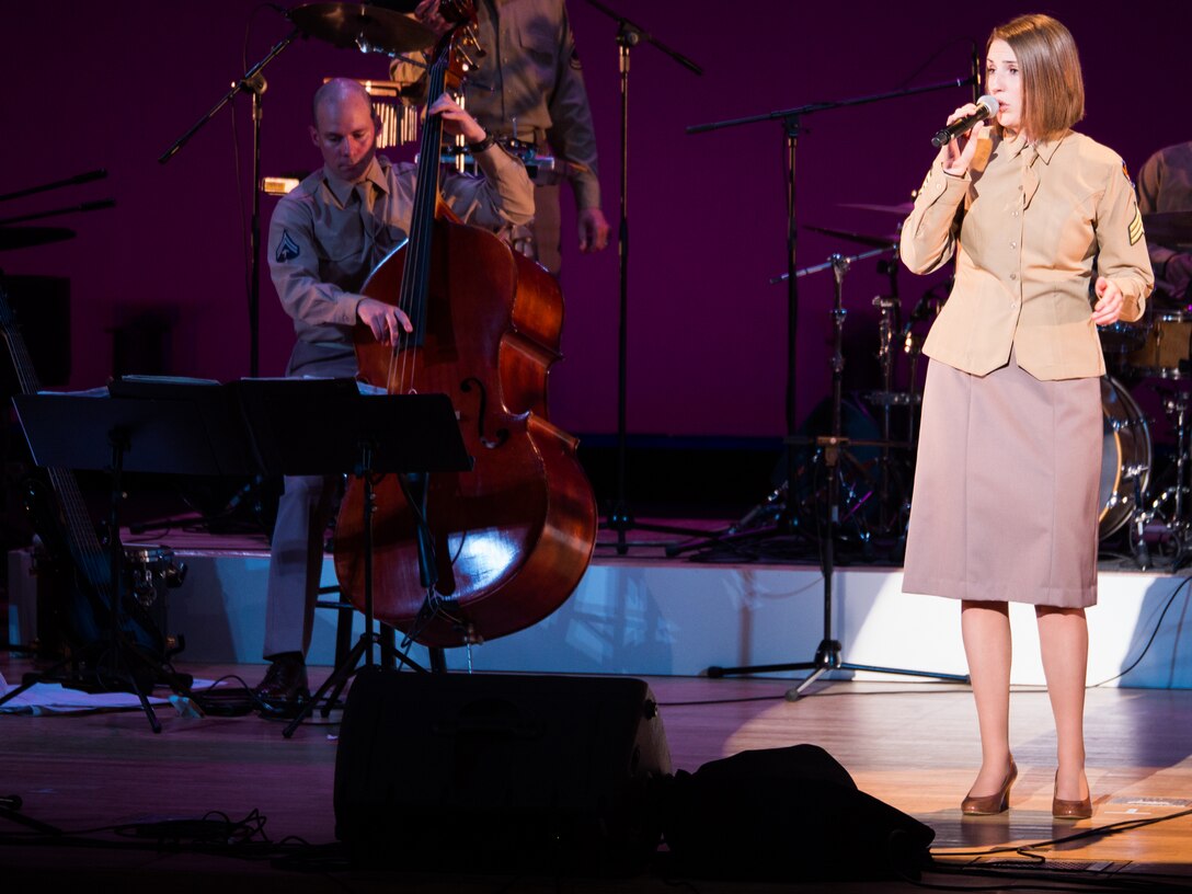 JOETSU CITY, Japan -- Airman First Class Rebecca Allen, Band of the Pacific-Asia vocalist, performs with Pacific Showcase in her "pinks and greens" in Joetsu City, Niigata, Japan on June 4, 2014. Pacific Showcase played an array of big band jazz and tunes from the Glenn Miller era. (U.S. Air Force photo by Staff Sgt. Josh Voyles)
