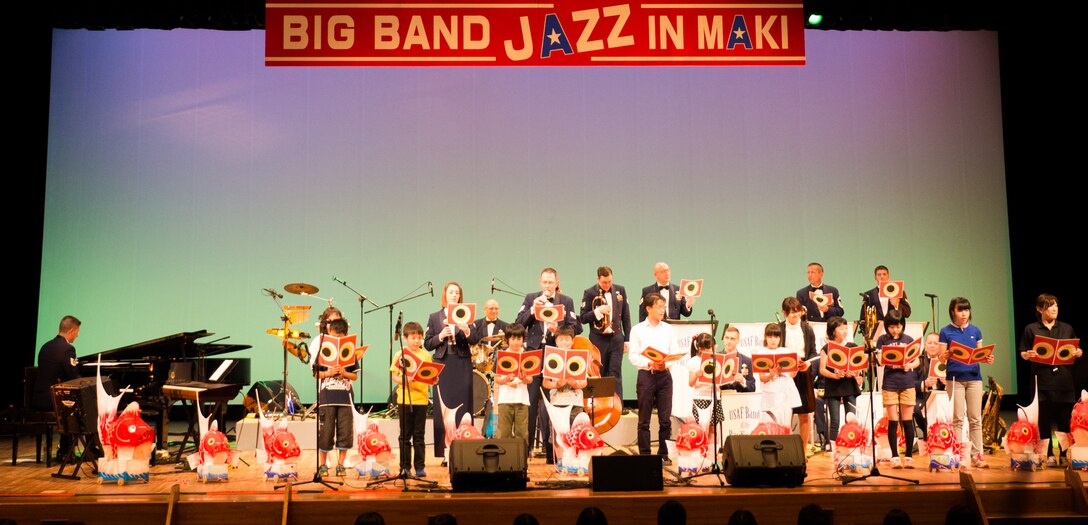 NISHIKAN-KU, Japan - Pacific Showcase, Band of the Pacific-Asia jazz ensemble, performs "Taiguruma" with local elementary school children in Nishikan-ku, Niigata City, Japan on June 2, 2014. Three American citizens from Galveston, TX, Niigata's sister city, attended the concert. (U.S. Air Force photo by Staff Sgt. Josh Voyles)