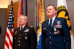 Air Force Maj. Gen. Jonathan T. Treacy, right, stands at attention alongside Army Gen. Frank Grass, chief National Guard Bureau, during the reading of his retirement order at a ceremony in Treacy’s honor, June 6 at Arlington Hall in Arlington, Va. Treacy, who most recently served as the special assistant to the chief, National Guard Bureau, served for more than 30 years in uniform. 