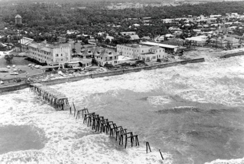 The Atlantic Beach Hotel and pier were devastated by the impacts of Hurricane Dora. The storm lingered off the Atlantic coast for nearly 24 hours, allowing winds to drive the storm surge to a point 10 feet above normal tide.