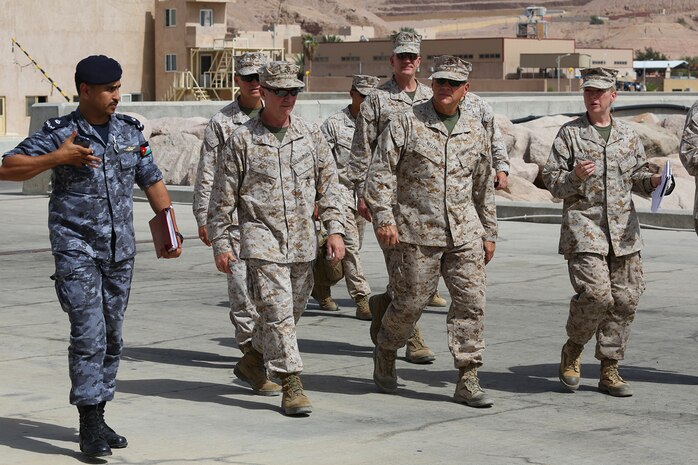AQABA, Jordan (May 28, 2014) Lieutenant Gen. Robert B. Neller, commander, U.S. Marine Corps Forces Central Command, walks up the ramp of the USNS 1st LT Baldomero Lopez for a ship’s tour with Brig. Gen. Ibrahim Al-Noamat, deputy commander, Royal Jordanian Naval Forces, along with more than 30 different general officers and military officials from five different continents. The Lopez, a maritime pre-positioning vessel was moored at the Royal Jordanian Naval Base for a four-day offload of military vehicles and gear in support of Exercise Eager Lion 2014.  Eager Lion is a recurring, multinational exercise designed to strengthen military-to-military relationships, increase interoperability between partner nations and enhance regional security and stability. (U.S. Marine Corps photo by Master Sgt. Will Price/Released)