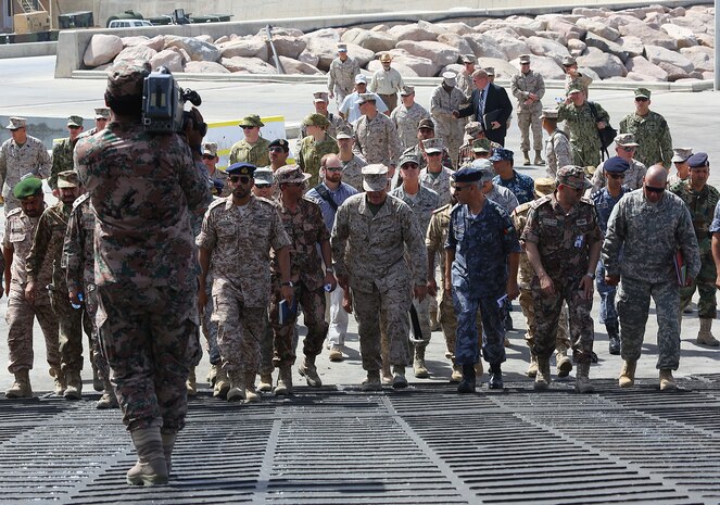 AQABA, Jordan (May 28, 2014) Lieutenant Gen. Robert B. Neller, commander, U.S. Marine Corps Forces Central Command, walks up the ramp of the USNS 1st LT Baldomero Lopez for a ship’s tour with Brig. Gen. Ibrahim Al-Noamat, deputy commander, Royal Jordanian Naval Forces, along with more than 30 different general officers and military officials from five different continents. The Lopez, a maritime pre-positioning vessel was moored at the Royal Jordanian Naval Base for a four-day offload of military vehicles and gear in support of Exercise Eager Lion 2014.  Eager Lion is a recurring, multinational exercise designed to strengthen military-to-military relationships, increase interoperability between partner nations and enhance regional security and stability. (U.S. Marine Corps photo by Master Sgt. Will Price/Released)