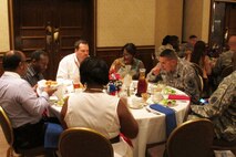 Huntsville Center workers fellowship with  Soldiers during Team Redstone National Prayer Luncheon..