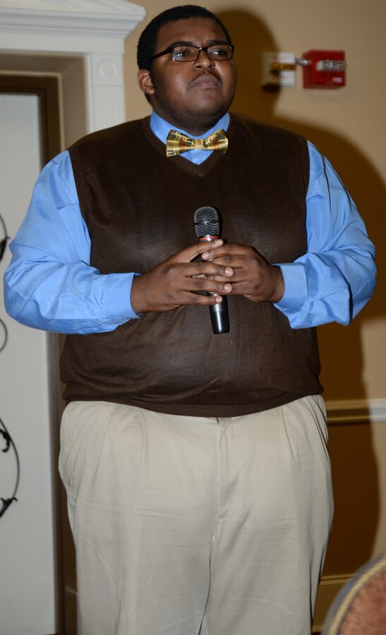 Othellious Cato, guest speaker at Marine Corps Logistics Base Albany’s retiree breakfast, recites his oration, “A Warrior's Prayer: The Courage of our Servicemen,” June 4 at the Town and Country Restaurant Grand Ballroom.