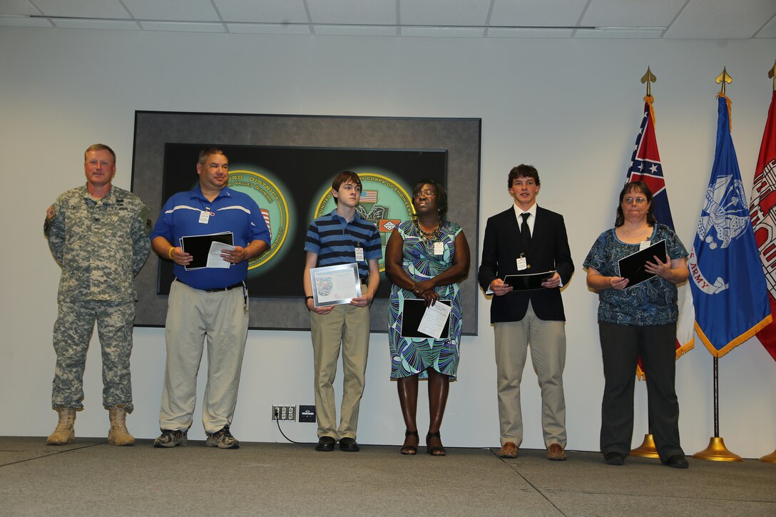 Vicksburg, Miss……The U. S. Army Corps of Engineers Vicksburg District recently commended local high school students and teachers from area schools that excelled in the fields of science, technology, engineering, and math (STEM) during the past school year.

Colonel John W. Cross, Commander of the Vicksburg District, presented certificates of appreciation to the students and teachers at the District’s annual awards ceremony held at the District’s headquarters.

Pictured Left to Right: Col. John Cross, Commander, Vicksburg District; Terry Wong, Warren Central High School; Trevor Talbot, Vicksburg High School; Cassandra Farrish, Vicksburg High School; Jordan  Locke, Porter’s Chapel Academy; Frances Warren, Porter’s Chapel Academy; Mattea Mobley, Warren Central High School, not shown