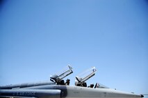 Lt. Col. Ripley Woodard, left, and Maj. Cameron Williams, Joint Base San Antonio-Randolph 415th Flight Test Flight pilots, conduct start-up procedures in an AT-38B Talon on the flight line of Laughlin Air Force Base, Texas, June 10, 2014. The AT-38B is assigned to the 96th Test Group at Holloman Air Force Base, New Mexico, whose mission is to operate world-class test facilities for high speed sled track testing, navigation and guidance system testing, radar signature measurements, weapon systems flight testing, and Air Force Liaison for all AF programs tested at the Army’s White Sands Missile Range in New Mexico.  (U.S. Air Force photo by Staff Sgt. Steven R. Doty, 47th Flying Training Wing.)(Released)