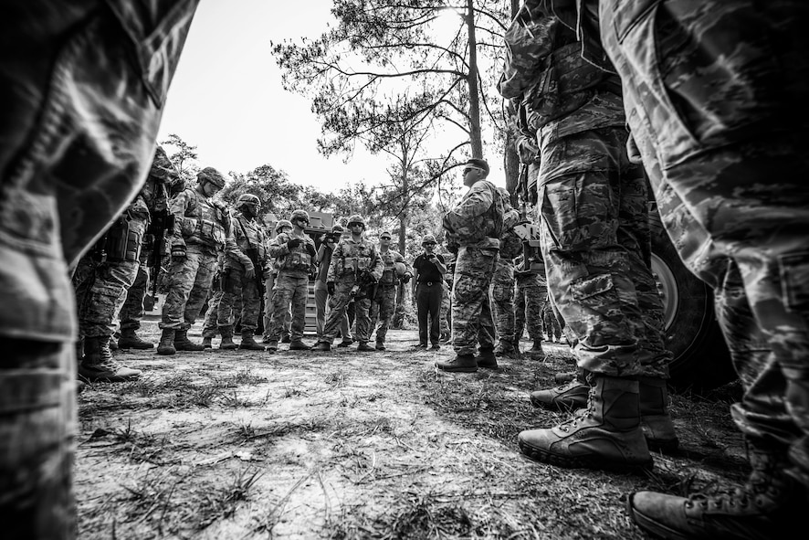 U.S. Air Force Staff Sgt. Pablo Cancel, 822nd Base Defense Squadron fire team leader, provides guidance on an upcoming training demonstration during the “Inside Combat Rescue: The Last Stand” media day at Moody Air Force Base, Ga., June 11, 2014. Cancel ensured that the Airmen were aware of their responsibilities during the demonstration. (U.S. Air Force photo by Senior Airman Douglas Ellis/Released)

