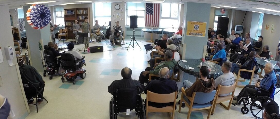 The Blue Aces, a popular music group that is part of the USAF Heritage of America Band, performs for veterans at the St. Albans Community Living Center in Queens, New York City, NY.