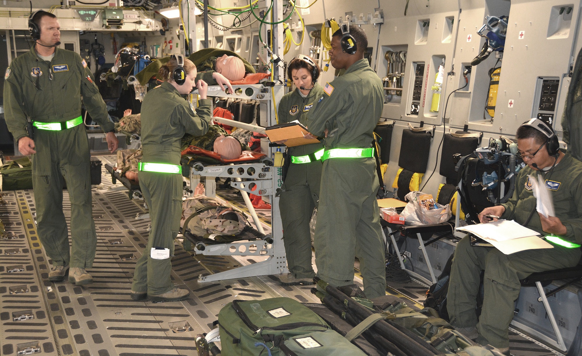A 446th Aeromedical Evacuation Squadron team of medical personnel provide inflight patient care during the Rainier Medic course held May 27 - June 6.  The 446th AES flew two missions a day in the second week of the course. (U.S. Air Force Reserve photo by Master Sgt. Kenneth Bielas)