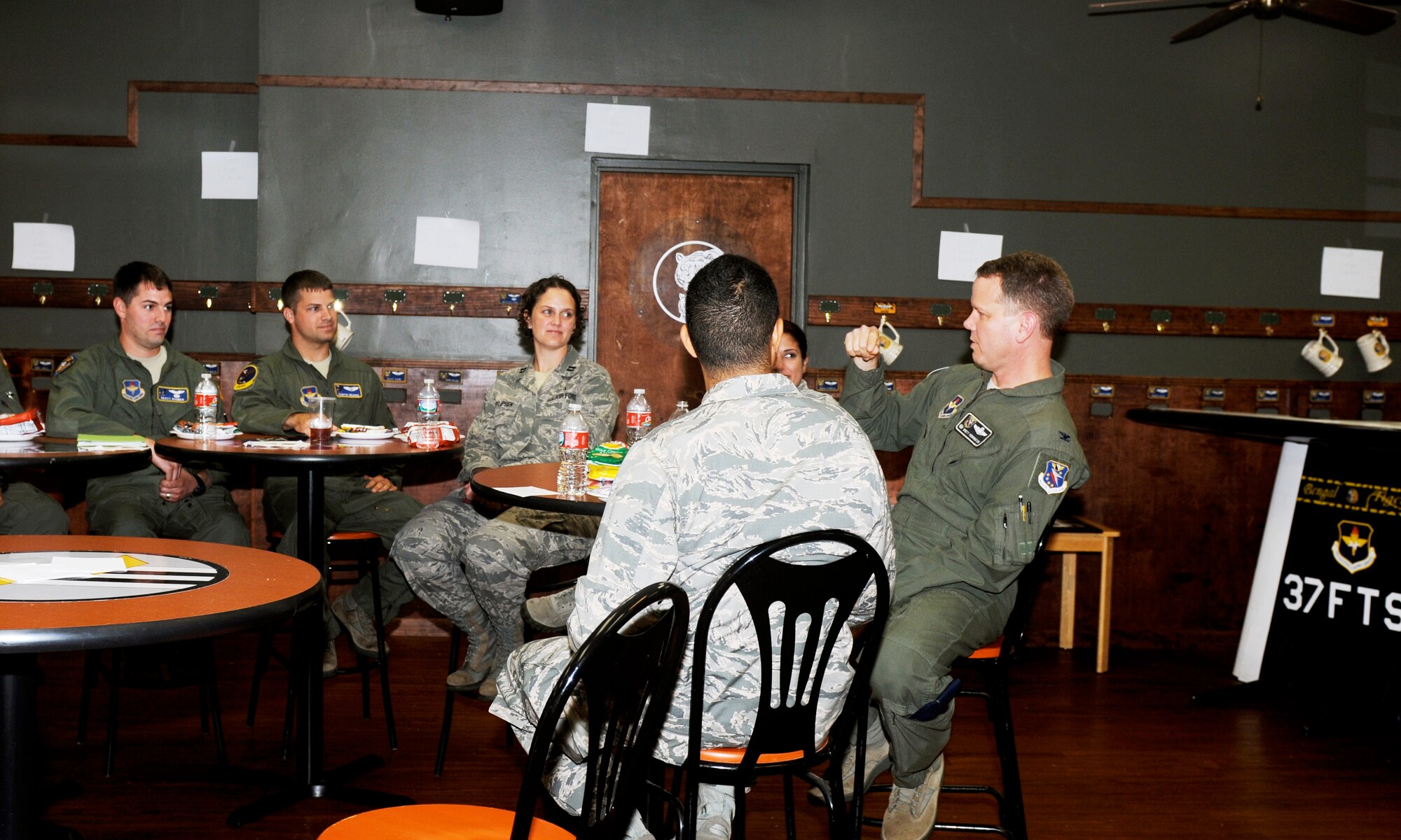 Col. Brett Pennington, Commander of the 14th Operations Group, speaks at the Company Grade Officers Council luncheon in the 37th Flying Training Squadron heritage room at Columbus Air Force Base, June 10. At the CGOC luncheon, Pennington encouraged Airmen to learn from someone they admired, be it a commander, supervisor or a co-worker. (U.S. Air Force photo/ Sharon Ybarra)