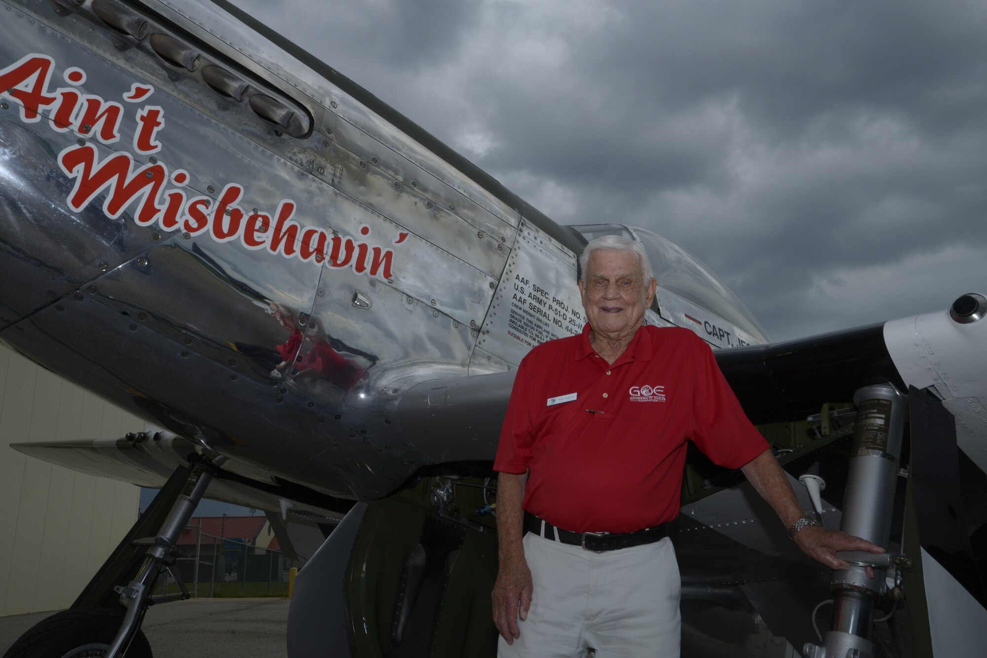 Col. Clarence “Bud” Anderson (retired) stands in front of a P-51 Mustang  during the Gathering of Eagles annual event at Maxwell Air Force Base, June 6, 2014. Anderson, who is a triple Ace from WWII, flew a P-51 Mustang during the allied invasion of Normandy 70 years ago to the day, known as D-Day. (U.S. Air Force photo by Staff Sgt. Gregory Brook)