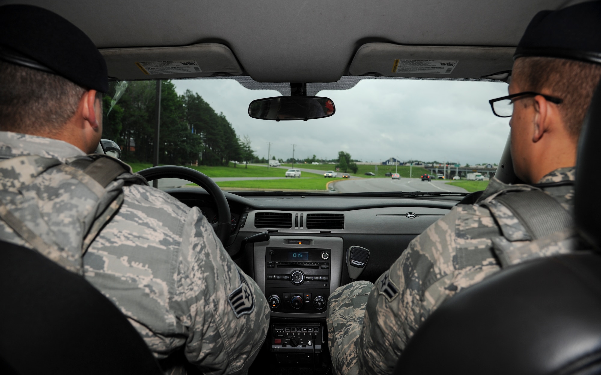 Staff Sgt. Matthew Mundy and Airman 1st Class Kyle McCann, two 19th Security Forces Squadron patrolmen inspect the base perimeter June 10, 2014, in Jacksonville, Ark. The jurisdiction of the 19th SFS includes both on and off base areas. (U.S. Air force photo by Airman 1st Class Harry Brexel) 