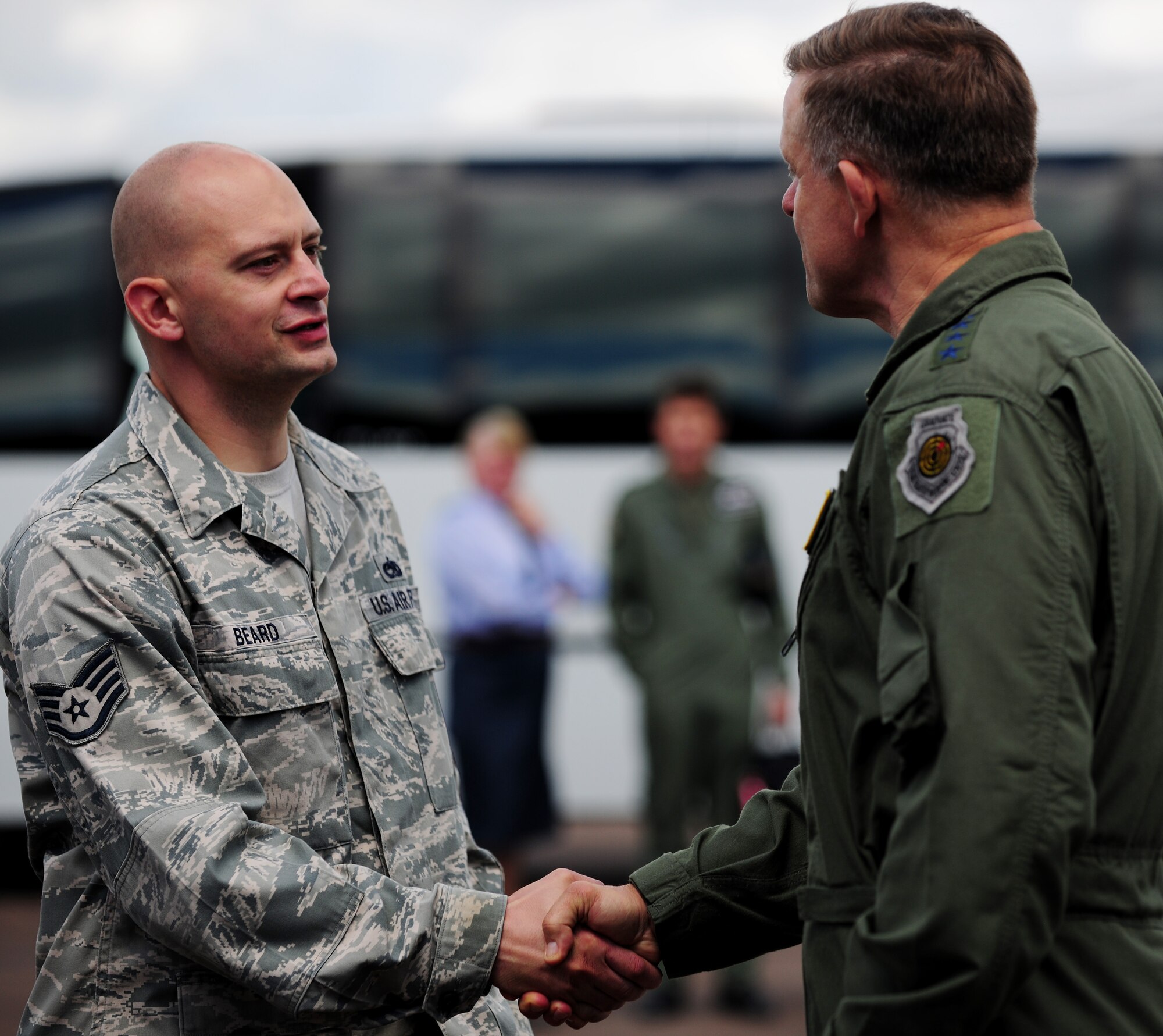 Gen. Frank Gorenc, U.S. Air Forces in Europe and U.S. Air Forces Africa commander, right, thanks Staff Sgt. Wesley Beard, 2nd Maintenance Squadron from Barksdale Air Force Base, La., during a visit to RAF Fairford, United Kingdom, June 10, 2014. Beard, along with several Airmen from various wings, stood up an operational wing during a short-term deployment and training operation. (U.S. Air Force photo by Staff Sgt. Jarad A. Denton/Released)