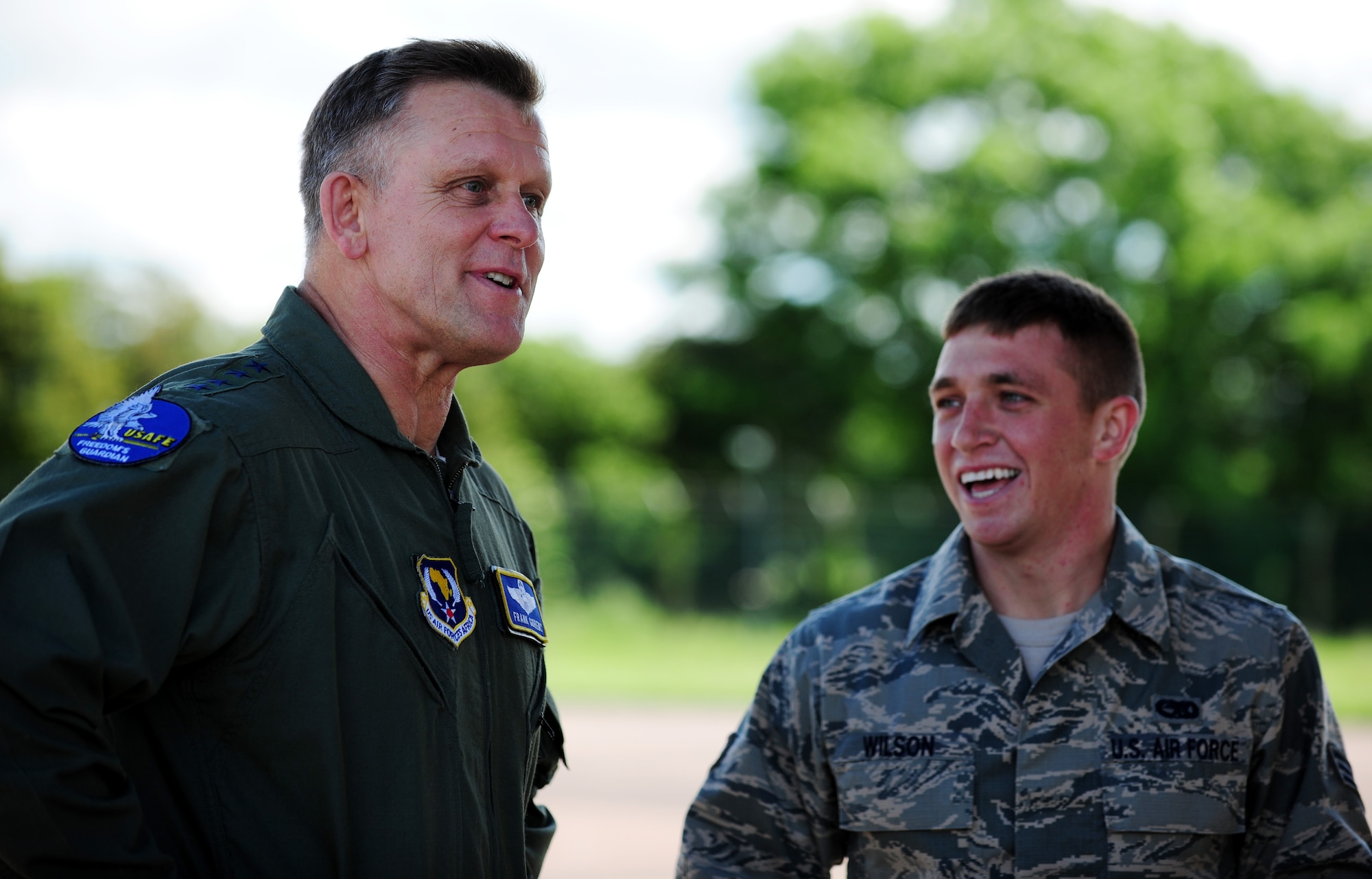 Gen. Frank Gorenc, U.S. Air Forces in Europe and U.S. Air Forces Africa commander, left, swaps stories with Senior Airman Jeffrey Wilson, 2nd Aircraft Maintenance Squadron from Barksdale Air Force Base, La., during a visit to RAF Fairford, United Kingdom, June 10, 2014. During the visit, Gorenc engaged with Airmen on various issues, including deployments, force management and budget concerns. (U.S. Air Force photo by Staff Sgt. Jarad A. Denton/Released)
