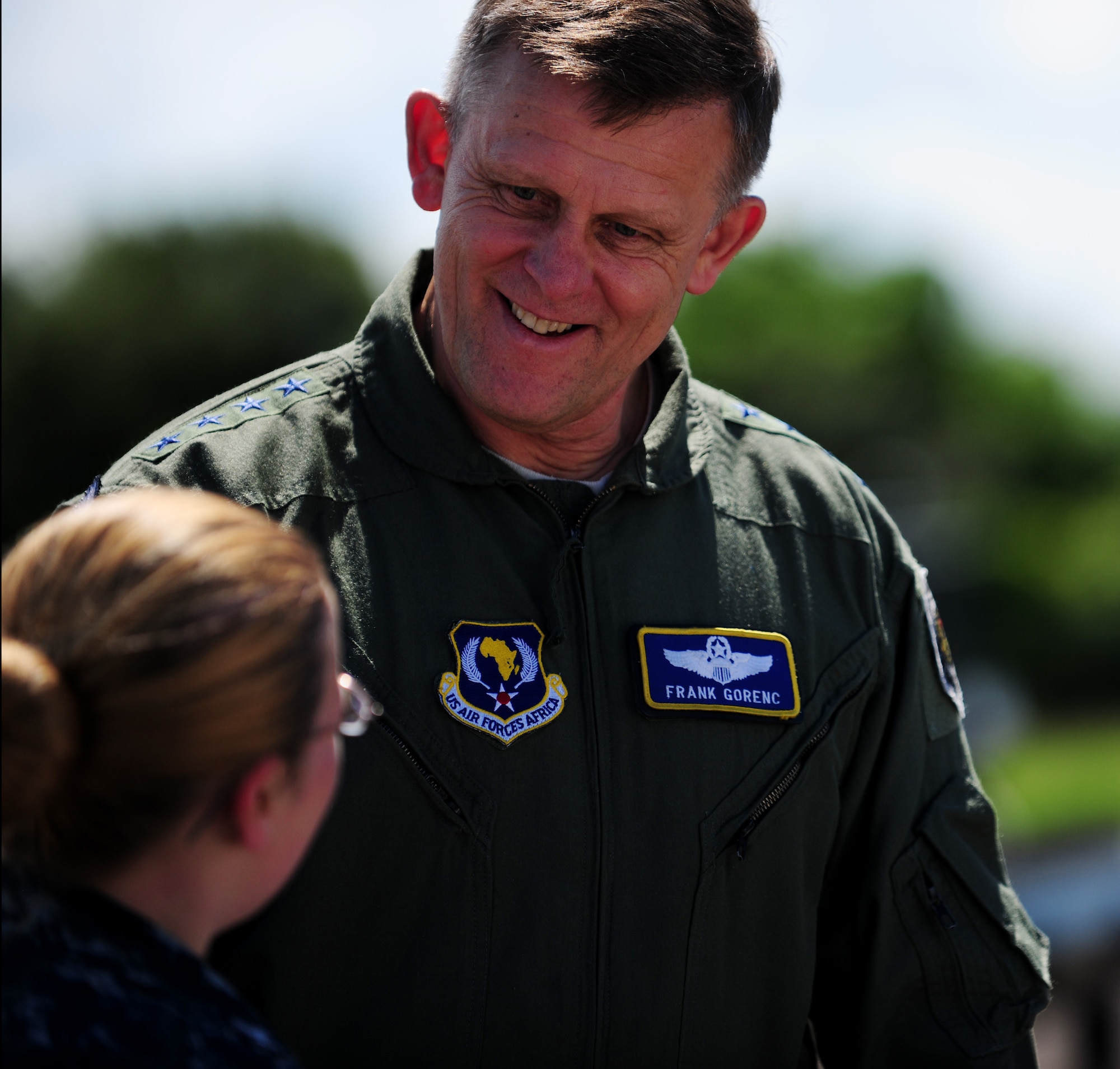 U.S. Air Force Gen. Frank Gorenc, U.S. Air Forces in Europe and U.S. Air Forces Africa commander, speaks with U.S. Navy Mineman 3rd Class Paige Hensel, from Joint Base Charleston, S.C., during a visit to RAF Fairford, United Kingdom, June 10, 2014. Hensel briefed Gorenc on the various types of munitions a B-52 Stratofortress can carry and about training they conduct with the Air Force. (U.S. Air Force photo by Staff Sgt. Jarad A. Denton/Released)