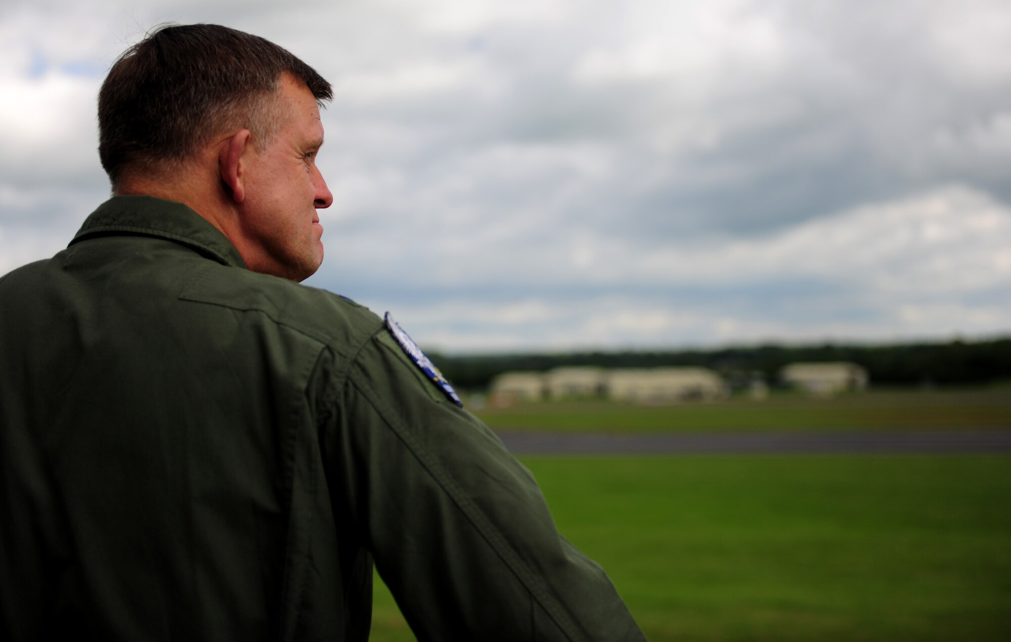 Gen. Frank Gorenc, U.S. Air Forces in Europe and U.S. Air Forces Africa commander, surveys RAF Fairford, United Kingdom, from atop the Air Traffic Control Tower June 10, 2014. Recently, RAF Fairford became host to several Airmen from various stateside wings on a short-term deployment and training operation. (U.S. Air Force photo by Staff Sgt. Jarad A. Denton/Released)