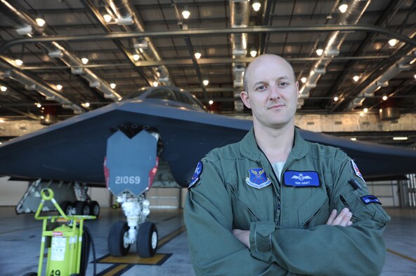 Royal Air Force Flight Lieutenant Ian Hart, GR4 Tornado pilot, stands in front of the “Spirit of Louisiana” B-2 Spirit at RAF Fairford, England June 10, 2014. Hart is part of a United States-United Kingdom exchange program, where he trains alongside American B-2 pilots. Since 2012, he has been flying the B-2 as part of the 13th Bomb Squadron, Whiteman Air Force Base, Missouri. He has 11 years of aviation experience. (U.S. Air Force photo by Staff Sgt. Nick Wilson/Released)