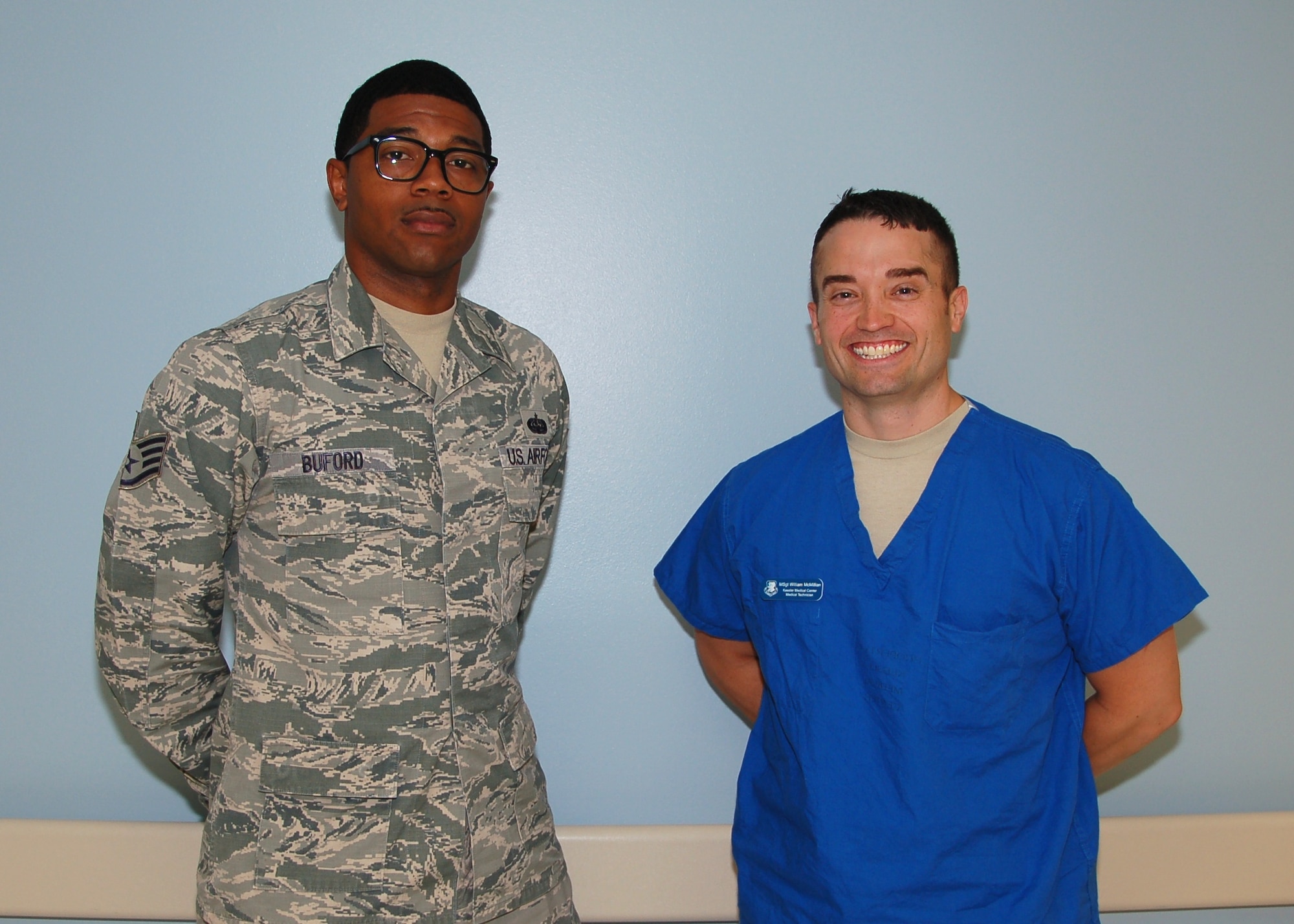 Staff Sgt. Gregory Buford, 338th Training Squadron, left, and Master Sgt. William McMillan, 81st Inpatient Operations Squadron, stand outside the Medical Center Family Birthing Center, June 3, Keesler Air Force Base, Miss. (U.S. Air Force photo by Steve Pivnick)
