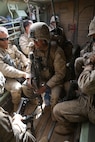 AQABA, Jordan - June 5, 2014, Marines with Battalion Landing Team 1/6, Charlie Company, 2nd Platoon, are transported inside an Assault Amphibious Vehicle for the Combined Armed Live Fire Exercise (CALFEX)  demonstration in support of Exercise Eager Lion 2014, June 5, at Jebel Petra, Jordan.  Eager Lion is a recurring, multinational exercise designed to strengthen military-to-military relationships, increase interoperability between partner nations and enhance regional security and stability.   (U.S. Marine Corps photo by; Sgt James A. Hall, CE MARFOR CENTCOM (FWD) Combat Camera/Released)