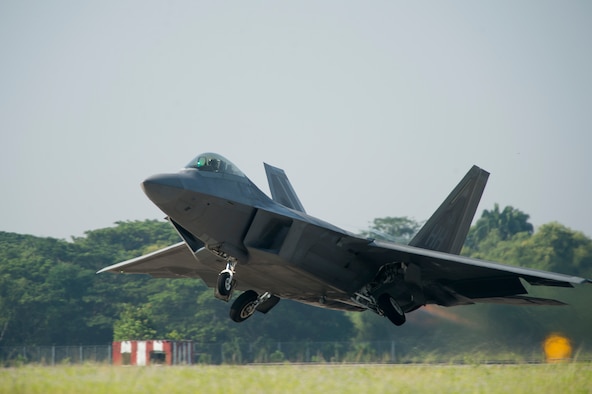 An F-22 Raptor takes off for an exercise sortie June 10, 2014, in support of Cope Taufan 14 at Royal Malaysian air force P.U. Butterworth, Malaysia. Cope Taufan is a biennial large force employment exercise taking place June 9 to 20. This marks the F-22's first deployment to Southeast Asia. The F-22 is from the 154th Wing, Joint Base Pearl Harbor-Hickam, Hawaii. (U.S. Air Force photo/Tech. Sgt. Jason Robertson)