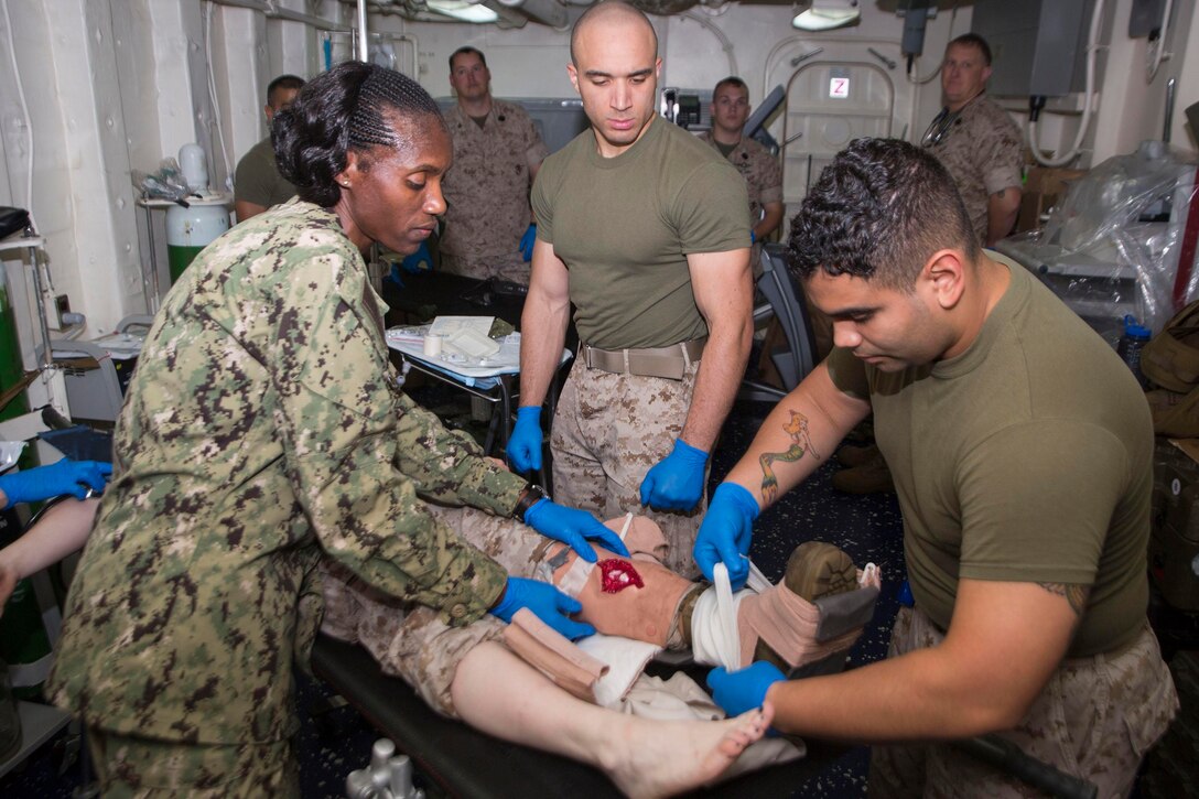 U.S. 5TH FLEET AREA OF RESPONSIBILITY (June 2, 2014) 22nd Marine Expeditionary Unit (MEU) and USS Mesa Verde (LPD 19) U.S. Navy corpsmen treat a simulated casualty during a mass casualty  exercise aboard the Mesa Verde. The 22nd MEU is deployed with the Bataan Amphibious Ready Group as a theater reserve and crisis response force throughout U.S. Central Command and the U.S. 5th Fleet area of responsibility. (U.S. Marine Corps photo by Cpl. Manuel A. Estrada/Released)