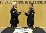 DIA’s oldest and youngest soldiers keep with tradition and toast to the Army’s 239th birthday June 13. 