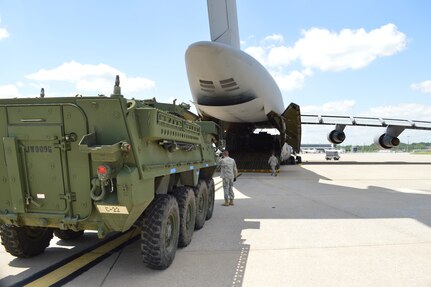 A Stryker Combat Vehicle from the 56th Stryker Brigade Combat Team's 2nd Squadron, 104th Cavalry sits on the ramp at the Harrisburg International Airport, Middletown, Pa., awaiting its turn to be loaded aboard a West Virginia National Guard C-5 bound for the Baltics, June 5, 2014. This is the fifth consecutive year the Stryker Brigade has participated in Exercise Saber Strike - an international exercise that is rotated annually between the countries of Latvia, Lithuania, and Estonia.