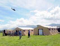 A UH-60 Blackhawk MEDEVAC helicopter takes off in simulated patient air evacuation during a exercise at Soto Cano Air Base, Honduras.  In preparation for the 2014 hurricane season, the Joint Task Force-Bravo Medical Element (MEDEL) conducted a humanitarian assistance/disaster response (HA/DR) exercise at Soto Cano Air Base June 12, 2014.  The MEDEL's mission was to establish a forward medical treatment operation capable of providing triage, primary care, surgical capabilities, patient holding and evacuation.  As part of this exercise, a suite of mobile technology applications that run on smartphones and tablets were used to enhance the capabilities of the unit: Global MedAid, Medical Application of Speech Translation (MAST) and GeoSHAPE.  (Photo by U. S. Air National Guard Capt. Steven Stubbs)