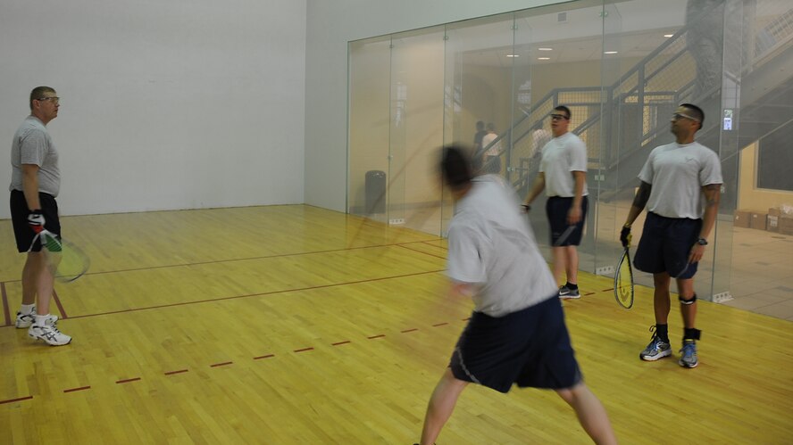 The Mighty Eighth Air Force faces off against the 2nd Maintenance Squadron Knucklebusters during Sports Day on Barksdale Air Force Base, La., June 13, 2014. Sports Day is an annual event giving Airmen an opportunity to participate in team sports and help increase morale and fitness awareness. (U.S. Air Force photo/Staff Sgt. Jason McCasland)