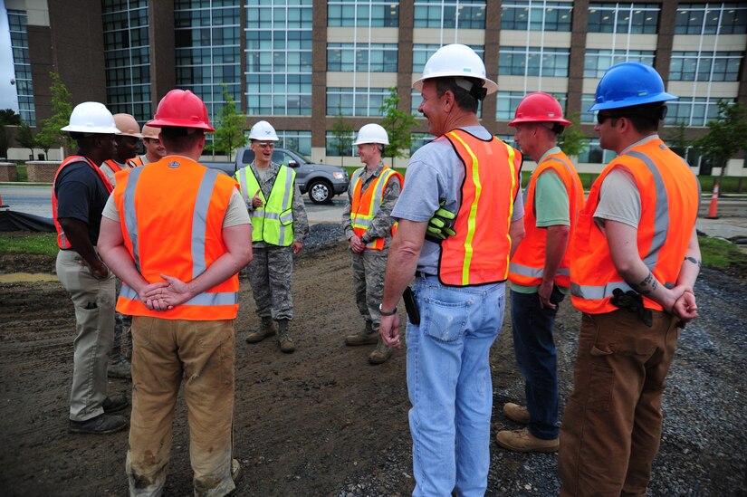 Col. Bill Knight, 11th Wing/Joint Base Andrews commander, speaks to 11th Civil Engineer Squadron Airmen about the vision of the Heritage Park project near the main entrance at Joint Base Andrews, Md., June 5, 2014. The groundwork for the park is slated to be completed by the end of June. (U. S. Air Force photo/Airman 1st Class Joshua R. M. Dewberry) 