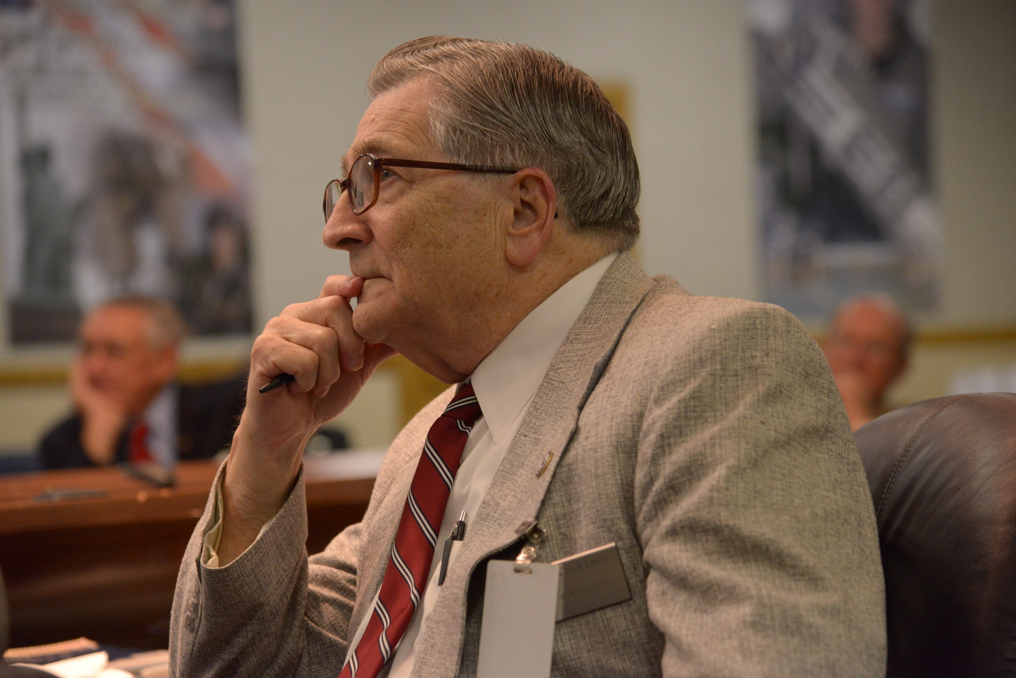 Retired Chief Master Sgt. Charles E. Lucas, representing Delaware, the District of Columbia and Maryland, listens to one of the many briefings during the 2014 Air Force Retiree Council meeting in May at Joint Base San Antonio-Randolph, Texas.  (U.S. Air Force photo/Joel Martinez)

