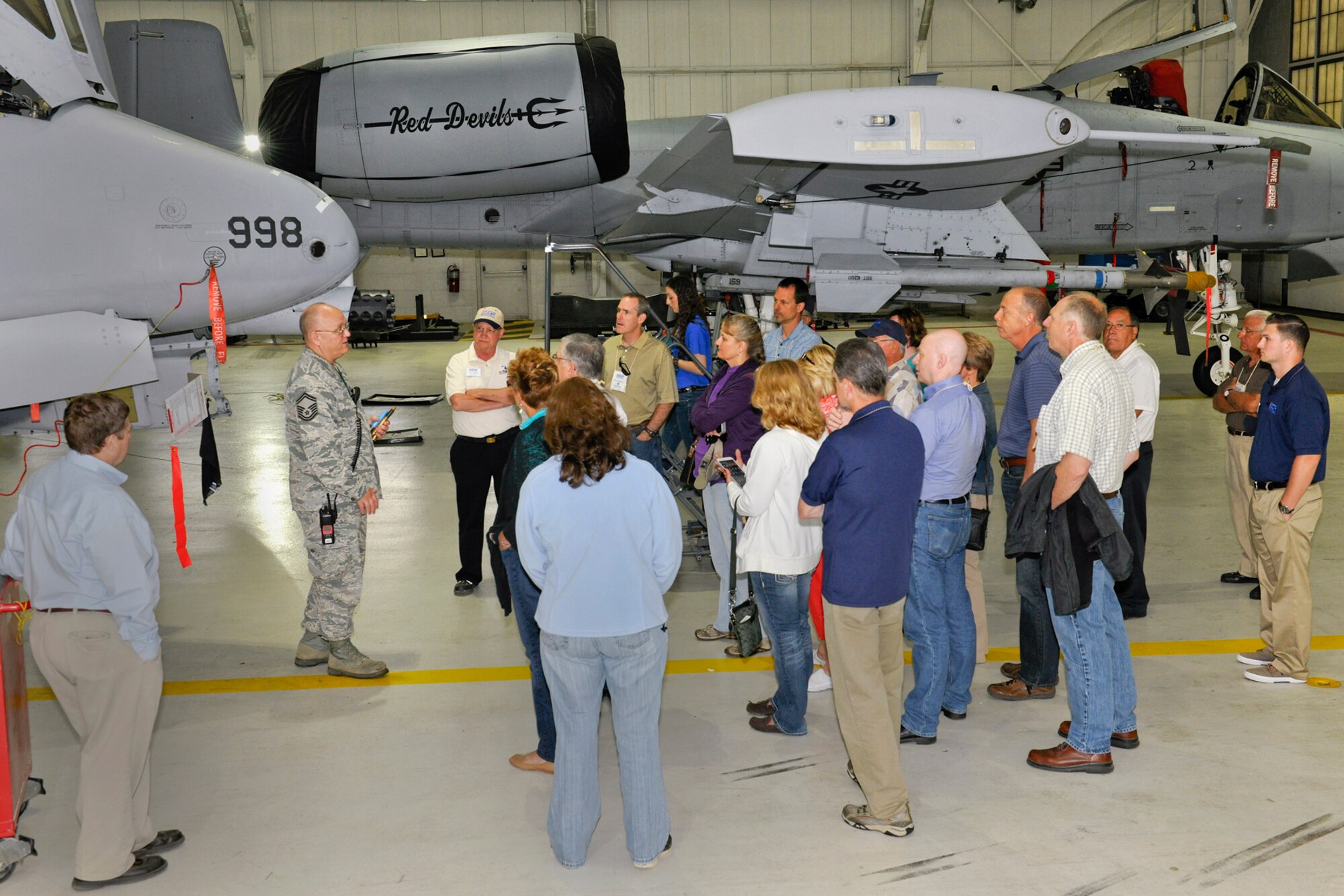 The Employer Support of the Guard & Reserve organization brought together employers from around the stateof Michigan to Selfridge Air National Guard Base June 12-13, 2014, for two-days of tours, briefings and interactions with military personnel assigned here.  One of the benefits of holding the ESGR tour at Selfridge is the fact that all five military services - Air Force, Army, Navy, Marine Corps, Coast Guard - have operations at the base.  ESGR, a Department of Defense office, was established in 1972 to promote cooperation and understanding between Reserve Component Service members and their civilian employers and to assist in the resolution of conflicts arising from an employee's military commitment. The group is shown here with 127th Wing  A-10 Thunderbolt II aircraft which are flown by the 107th Fighter Squadron.  (US Air National Guard photo by Terry Atwell)
