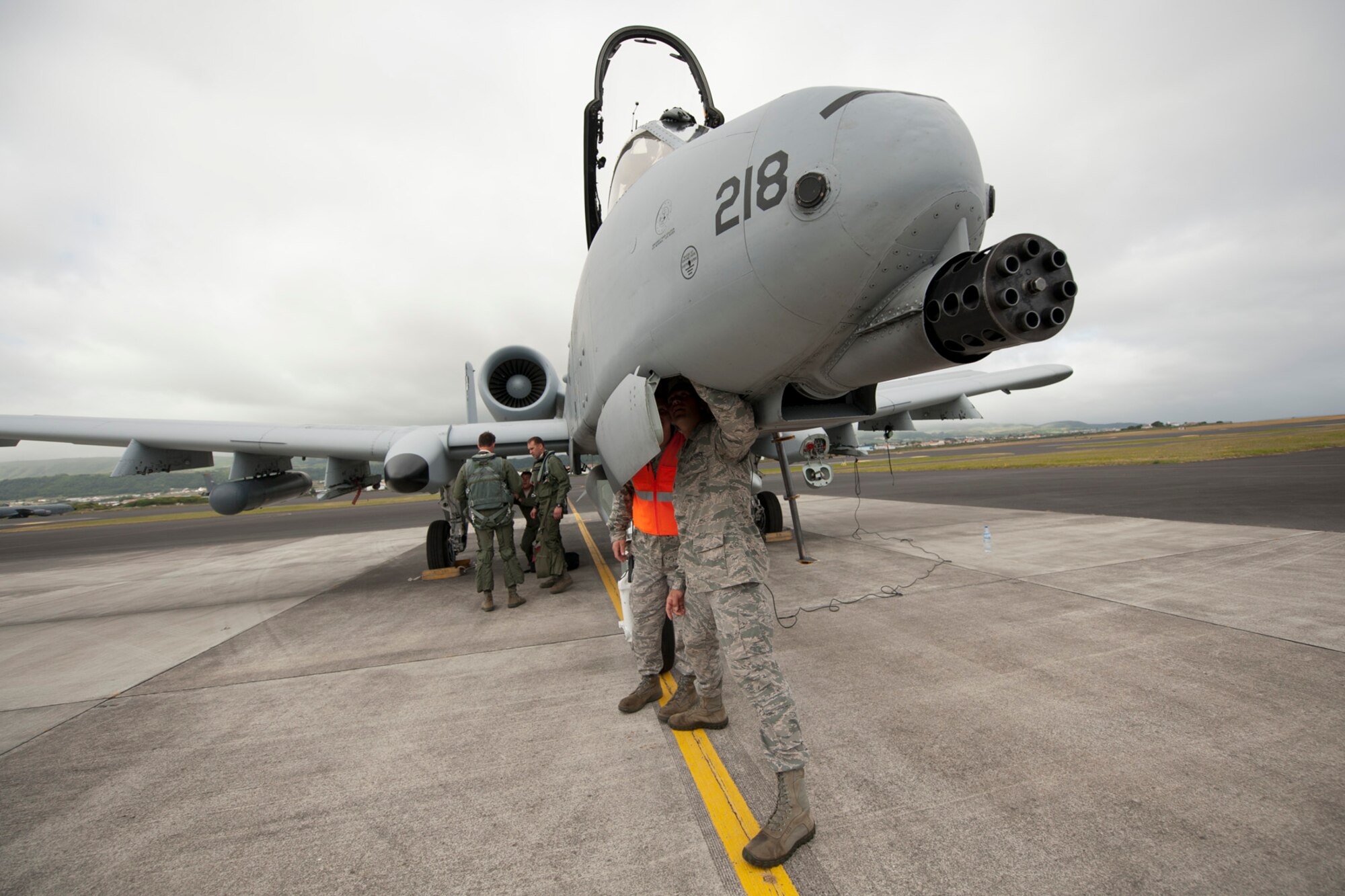 U.S. Air Force Staff Sgt. Robert McDonough, right, 65th Operations Support Squadron A-10 Thunderbolt crew chief, trains Staff Sgt. Tanner Schuman, 65th OSS aerospace ground equipment technician, on procedures to preflight A-10s June 10, 2014, Lajes Field, Azores, Portugal.  The A-10 is specifically designed for close air support, and is capable of large and varied ordnance load, long loiter time, accurate weapons delivery, austere field capability and survivability. (U.S. Air Force photo by Tech. Sgt. Paul Villanueva II/Released)