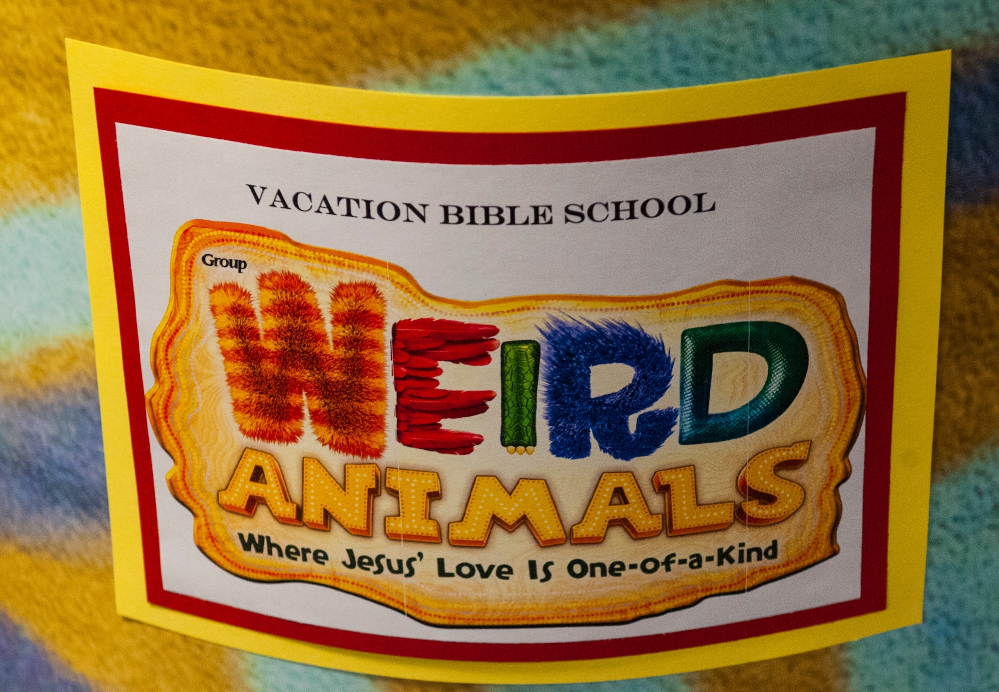 A poster hangs in the chapel for Vacation Bible School (VBS) at Moody Air Force Base, Ga., June 11, 2014. VBS was decorated with numerous signs to support this year’s theme weird animals. (U.S. Air Force photo by Airman 1st Class Ceaira Tinsley/Released)

