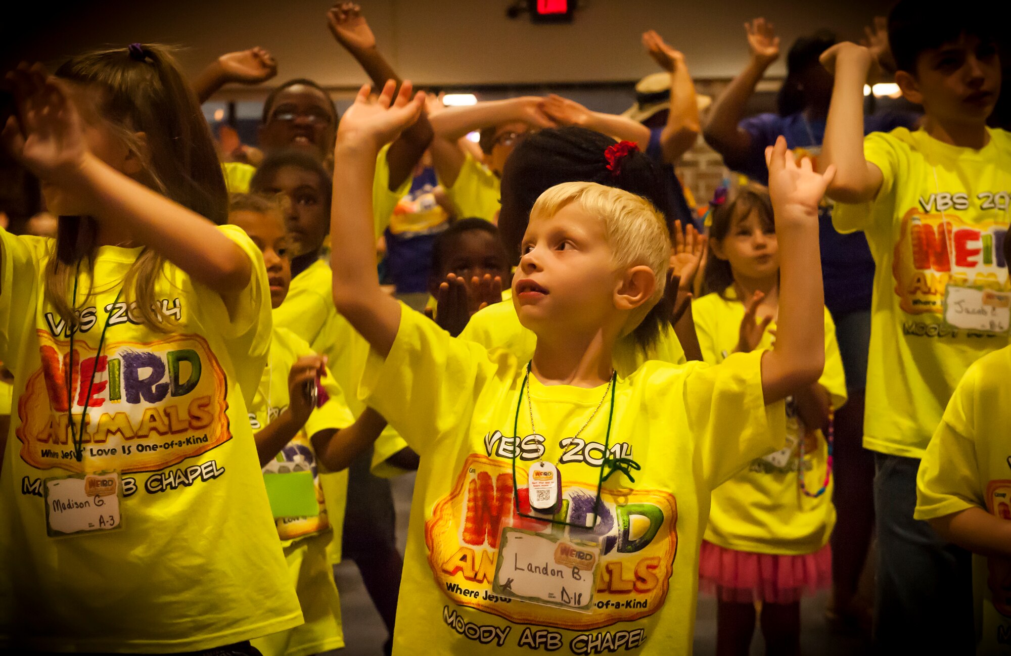 Landon Breining, son of U.S. Air Force Tech. Sgt. Thomas Breining, dances to music during Vacation Bible School (VBS) at Moody Air Force Base, Ga., June 11, 2014. Landon’s mother Dana has volunteered at VBS for the last five years. (U.S. Air Force photo by Airman 1st Class Ceaira Tinsley/Released)
