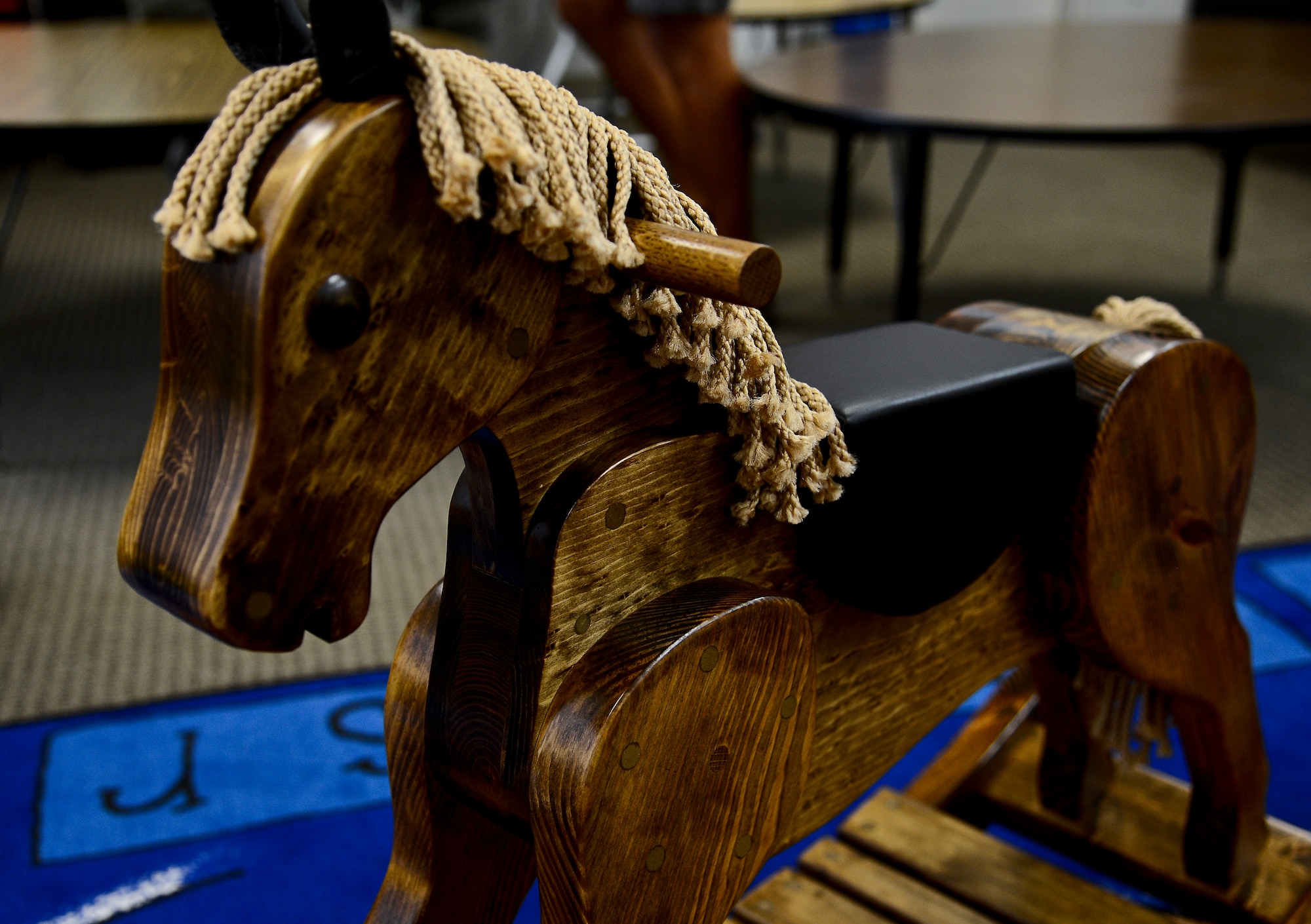 Steve Angelozzi, retired federal Department of Defense employee, donated rocking horse number 39, seen here, to the base chapel at MacDill Air Force Base, Fla., June 12, 2014. Angelozzi has donated 8-10 rocking horses to various people and places to include a wounded warrior and an honor flight here in Florida, Operation Shoebox, and several charities in Virginia. (U.S. Air Force photo by Senior Airman Vernon L. Fowler Jr./Released)